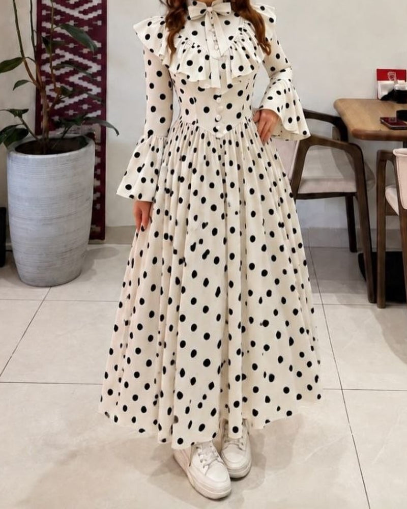 فستان نسائي طويل منقط بتصميم فيكتوري أنيق | أكمام كشكش وأزرار أمامية yourswomanswear